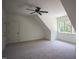 Spacious bedroom with plush carpeting, ceiling fan, and natural light from a large window at 1212 Perry Bluff Dr, Wake Forest, NC 27587