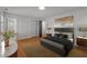 Charming bedroom with a modern bed, decorative wall art, and an en-suite bath at 129 Castle Dr, Smithfield, NC 27577