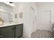 Modern bathroom featuring a stylish vanity, designer tile flooring and modern fixtures at 134 Beacon Dr, Pittsboro, NC 27312