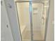 Modern tiled shower with glass door and built-in bench at 1412 Queen Trigger Dr, Fuquay Varina, NC 27526