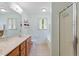 Bright and airy bathroom featuring a shower/tub combo, toilet, and double sink vanity at 153 Hickory Nut Dr, Smithfield, NC 27577