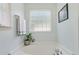 Relaxing soaking tub with glass block window for natural light and privacy at 153 Hickory Nut Dr, Smithfield, NC 27577