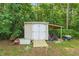 Well-maintained shed with a ramp, covered area, and ample storage for tools at 153 Hickory Nut Dr, Smithfield, NC 27577