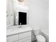 Bathroom featuring white subway tiling, a white vanity with drawers, and a toilet next to a white bathtub at 1621 Ella Wiggins Way, Raleigh, NC 27603