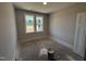 Bedroom with a window providing natural light and a view of the exterior at 165 Tee Dr, Selma, NC 27576