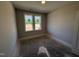 Bedroom with natural light from the two large windows at 165 Tee Dr, Selma, NC 27576