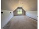 Unfinished attic with window and natural light, ready for customization and expansion at 183 Tee Dr, Selma, NC 27576