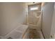 Partially completed bathroom features a tub/shower combo and vanity hookups, awaiting finishing touches at 183 Tee Dr, Selma, NC 27576