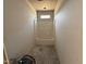 Cozy bathroom with a built-in tub and a small window, offering a peaceful retreat at 183 Tee Dr, Selma, NC 27576