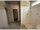 Bathroom featuring a new shower, awaiting final touches to create a modern and functional space at 183 Tee Dr, Selma, NC 27576