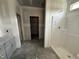 Bathroom under construction with a shower and vanity awaiting completion and personalization at 183 Tee Dr, Selma, NC 27576