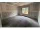 Unfinished bedroom with a large window providing natural light and customization potential at 183 Tee Dr, Selma, NC 27576
