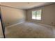 Bright bedroom with natural light, primed and ready for finishing touches, providing a serene atmosphere at 183 Tee Dr, Selma, NC 27576
