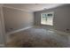An unfinished bedroom with window allowing natural light at 183 Tee Dr, Selma, NC 27576
