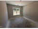 An unfinished bedroom with window allowing natural light at 183 Tee Dr, Selma, NC 27576