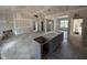 Unfinished kitchen with an island and cabinets ready for customization at 183 Tee Dr, Selma, NC 27576