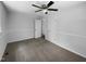 Clean, bright bedroom features fresh paint, carpet, ceiling fan, and base trim at 1914 Adams Pl, Hillsborough, NC 27278