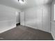 This bedroom features neutral walls, carpeted floors, and a closet for plenty of storage at 1914 Adams Pl, Hillsborough, NC 27278