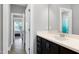 Elegant bathroom featuring modern vanity with a sleek counter-top and contemporary fixtures at 205 Silent Cove Ln, Holly Springs, NC 27540
