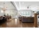 Bright and airy living room with hardwood floors and an open layout at 205 Silent Cove Ln, Holly Springs, NC 27540