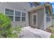 The back patio has a concrete slab and a doorway to the house at 211 Westgrove Ct, Durham, NC 27703
