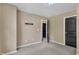 A spacious bedroom with neutral paint, carpet and a door leading to the ensuite at 211 Westgrove Ct, Durham, NC 27703