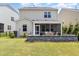 Backyard with a stone patio and a screened-in porch at 2128 Jollay St, Durham, NC 27703