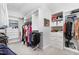 Spacious walk-in closet with custom shelving and ample storage space for clothes and accessories at 2128 Jollay St, Durham, NC 27703