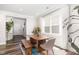 Cozy dining room with a wooden table, bench, and chairs at 2128 Jollay St, Durham, NC 27703