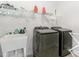 Practical laundry room with modern appliances and sink at 2128 Jollay St, Durham, NC 27703