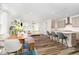 Open-concept living space with dining area, kitchen, and living room at 2128 Jollay St, Durham, NC 27703