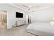 Spacious main bedroom featuring a tv, dresser and attached bath at 2128 Jollay St, Durham, NC 27703