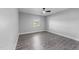Bedroom featuring hardwood floors, ceiling fan, with view from bright window at 2210 Pilot-Riley Rd, Zebulon, NC 27597