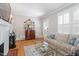 Comfortable living room with hardwood floors, fireplace and bright natural light at 2225 Creston Rd, Raleigh, NC 27608