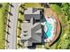 Aerial view of community featuring a pool, landscaping, and modern architecture at 2264 Jollay St, Durham, NC 27703