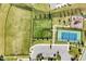 Overhead shot capturing the community's expansive green spaces, sports courts, playground, and surrounding landscaping at 2264 Jollay St, Durham, NC 27703