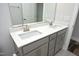 Bathroom featuring double sink vanity, modern fixtures, and large framed mirror at 2264 Jollay St, Durham, NC 27703