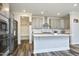 Contemporary kitchen with an island, stainless steel appliances, and ample storage space at 2264 Jollay St, Durham, NC 27703