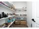 Organized pantry with ample shelving, providing generous storage space for kitchen essentials at 2264 Jollay St, Durham, NC 27703