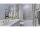 Well-lit bathroom featuring modern fixtures, stylish decor, and a shower-tub combo at 237 Tidal Pool Way, Cary, NC 27519