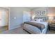 Cozy bedroom with soft carpet, neutral colors, and comfortable furnishings at 237 Tidal Pool Way, Cary, NC 27519