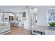 Open-concept living space showcasing a kitchen with an island and a dining area at 237 Tidal Pool Way, Cary, NC 27519