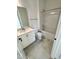 Bright bathroom features a white vanity, toilet, and a shower-tub combo with tile flooring at 2400 Abbeyhill Dr # 36, Raleigh, NC 27610
