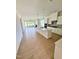Open concept living room and kitchen with hardwood flooring and plenty of natural light at 2400 Abbeyhill Dr # 36, Raleigh, NC 27610
