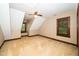 Bedroom showcasing angled ceilings, natural light and carpet flooring, creating a cozy retreat at 2416 Kearney Rd, Wake Forest, NC 27587