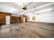 Spacious garage with ample lighting, workbench, windows, and lots of room for storage and activities at 2416 Kearney Rd, Wake Forest, NC 27587