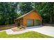 Detached two-car garage with a well-manicured lawn and driveway, offering convenience and curb appeal at 2416 Kearney Rd, Wake Forest, NC 27587