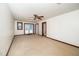Bright living room with a ceiling fan with easy access to the outdoors at 2416 Kearney Rd, Wake Forest, NC 27587