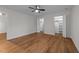 Bedroom with wood-look floors and walk-in closet at 2913 Coxindale Dr, Raleigh, NC 27615