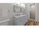 Main bathroom features double sink vanity and a glass-enclosed walk-in shower at 2913 Coxindale Dr, Raleigh, NC 27615